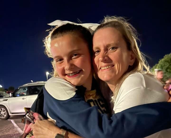 warm embrace between mother and daughter